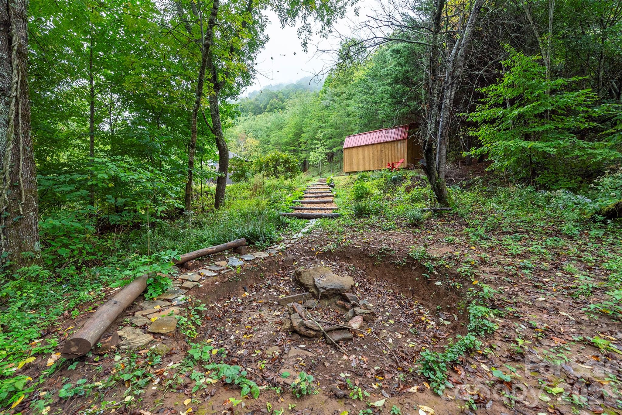 Wooded fire pit area - 281 Bearwallow Trail, Leicester