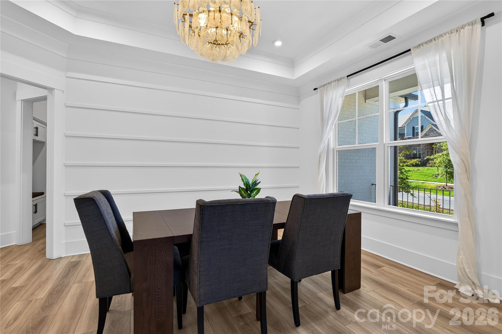 Tuesday night family meals. This room was made for all of it. - 1216 Glade Arch Lane, Huntersville