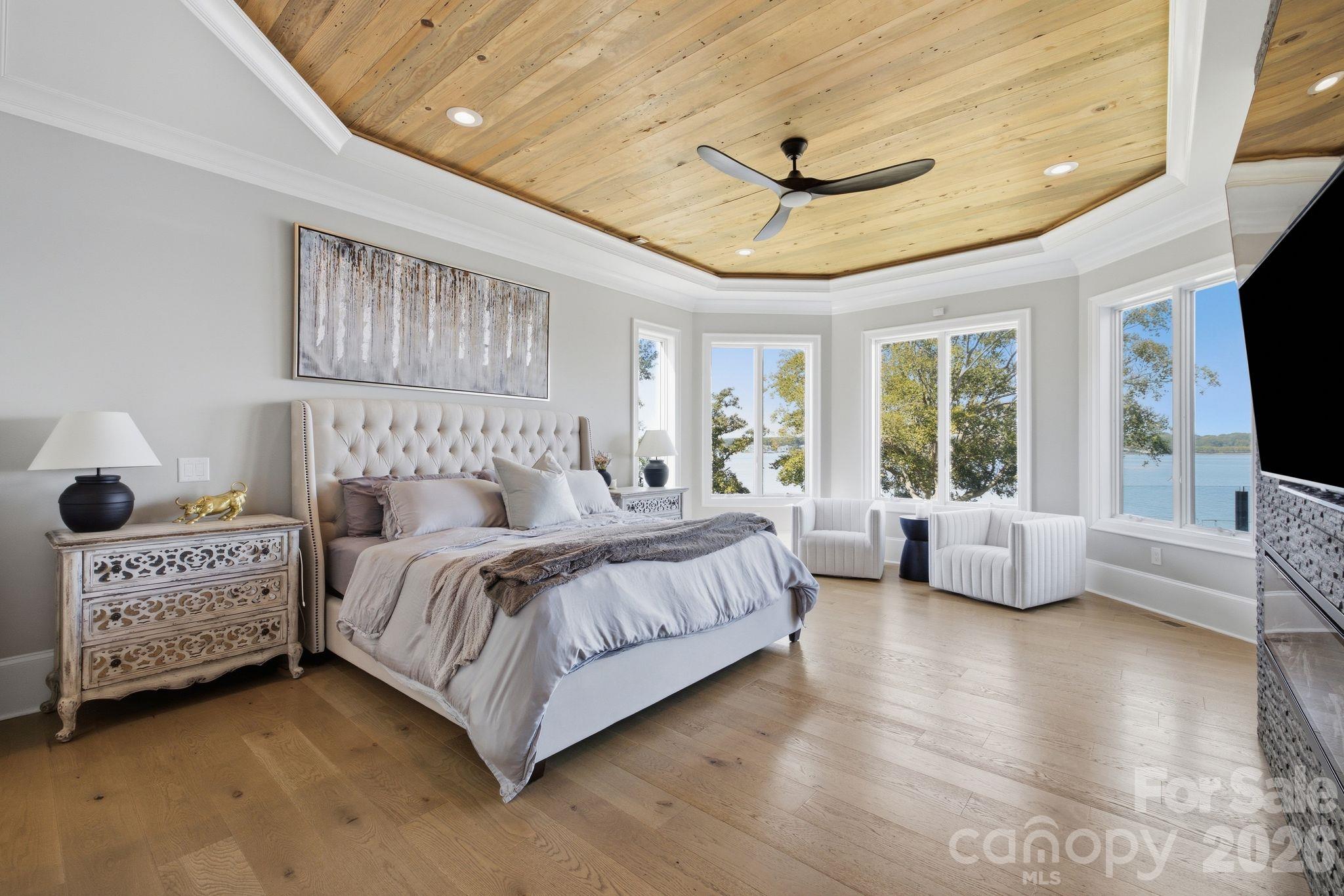 Main level primary bedroom. - 112 Birdsong Lane, Mooresville
