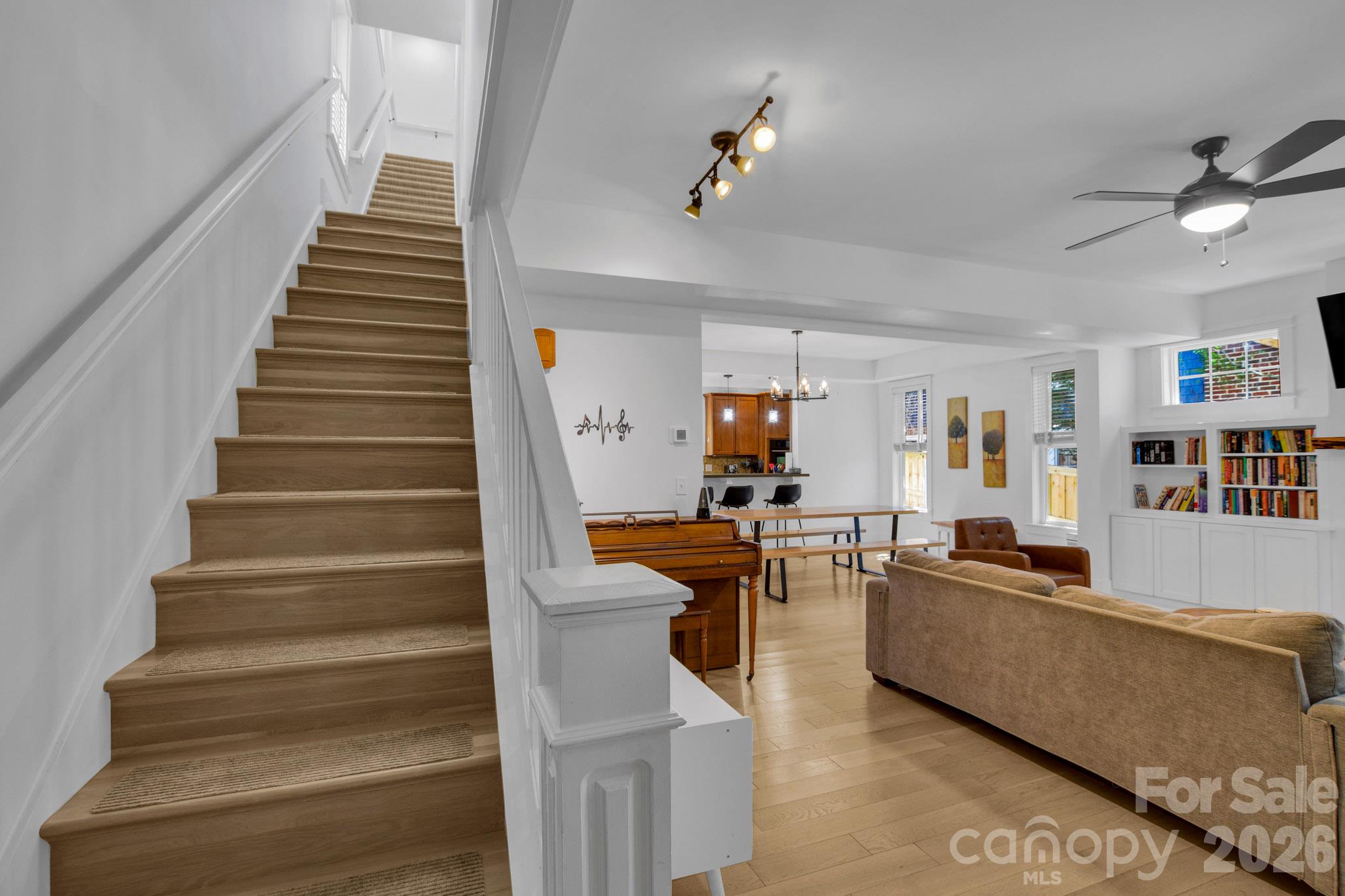 White oak stairs lead to the 2nd level - 92 Rumbough Place, Asheville