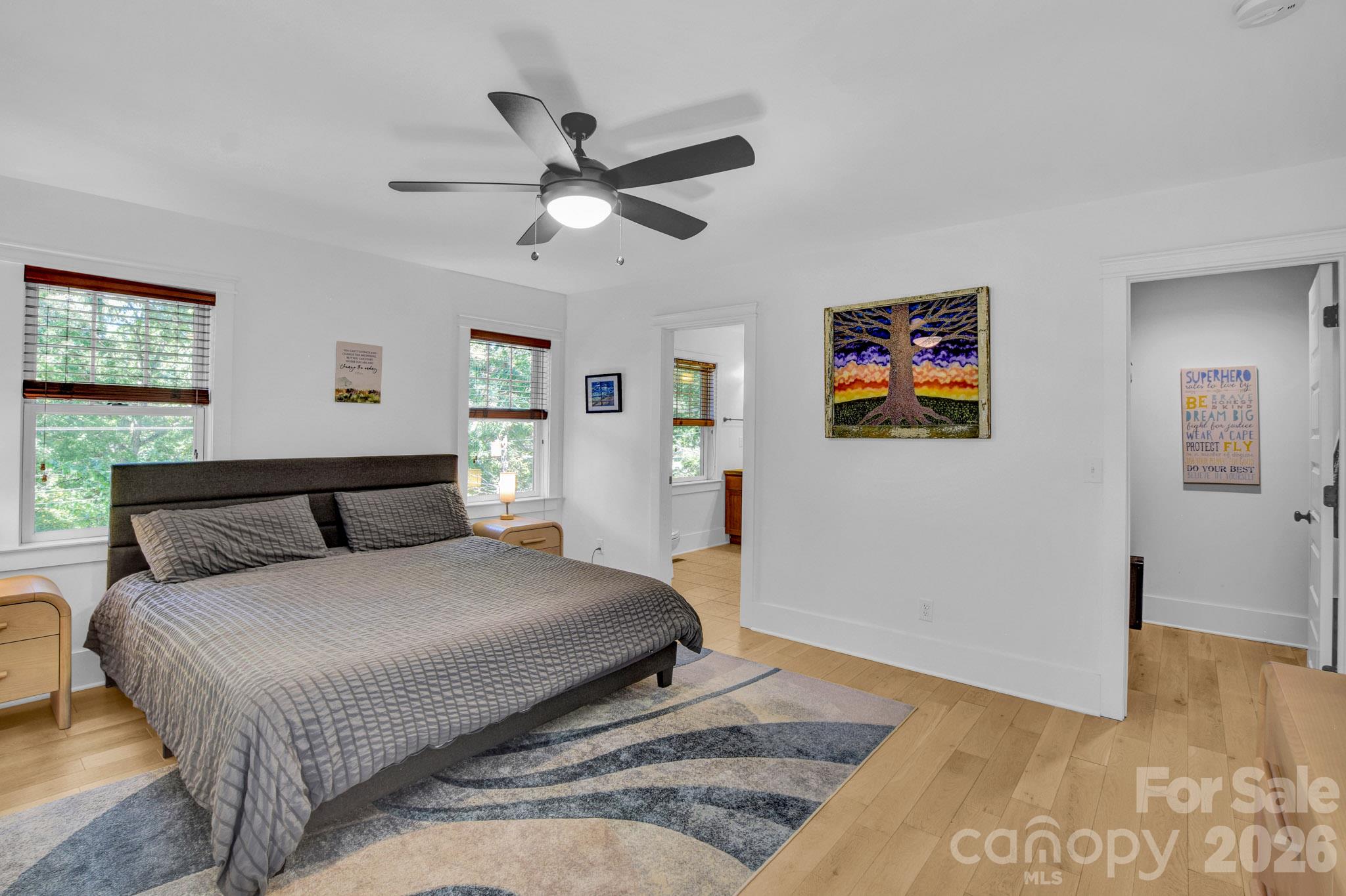 Enjoy the light filled primary ensuite with large walk-in closet. - 92 Rumbough Place, Asheville