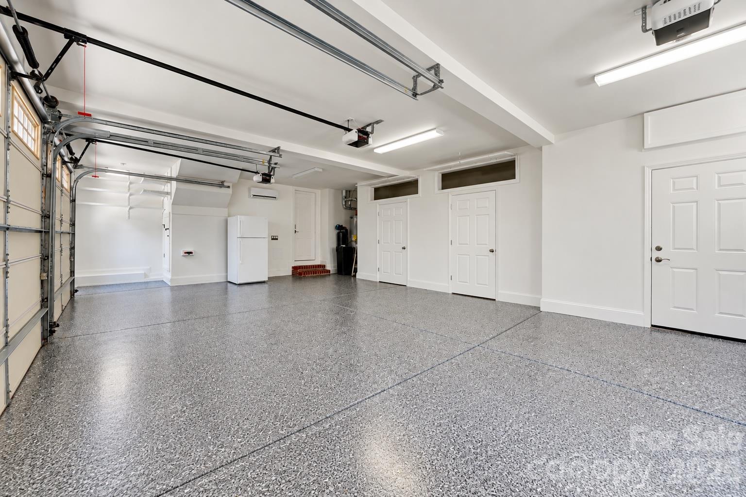 Brand New Epoxy Flooring in the garage - 109 Fitchburg Court, Mooresville