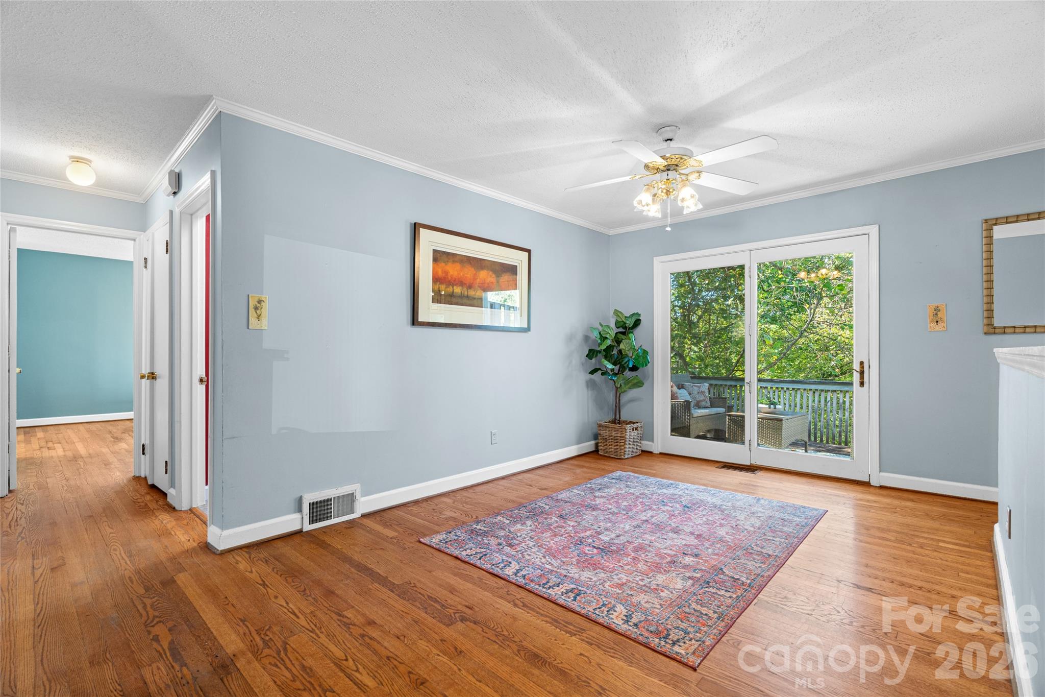 Welcoming dining space with abundant natural light—perfect for everyday meals and entertaining. - 18 Northwood Road, Asheville