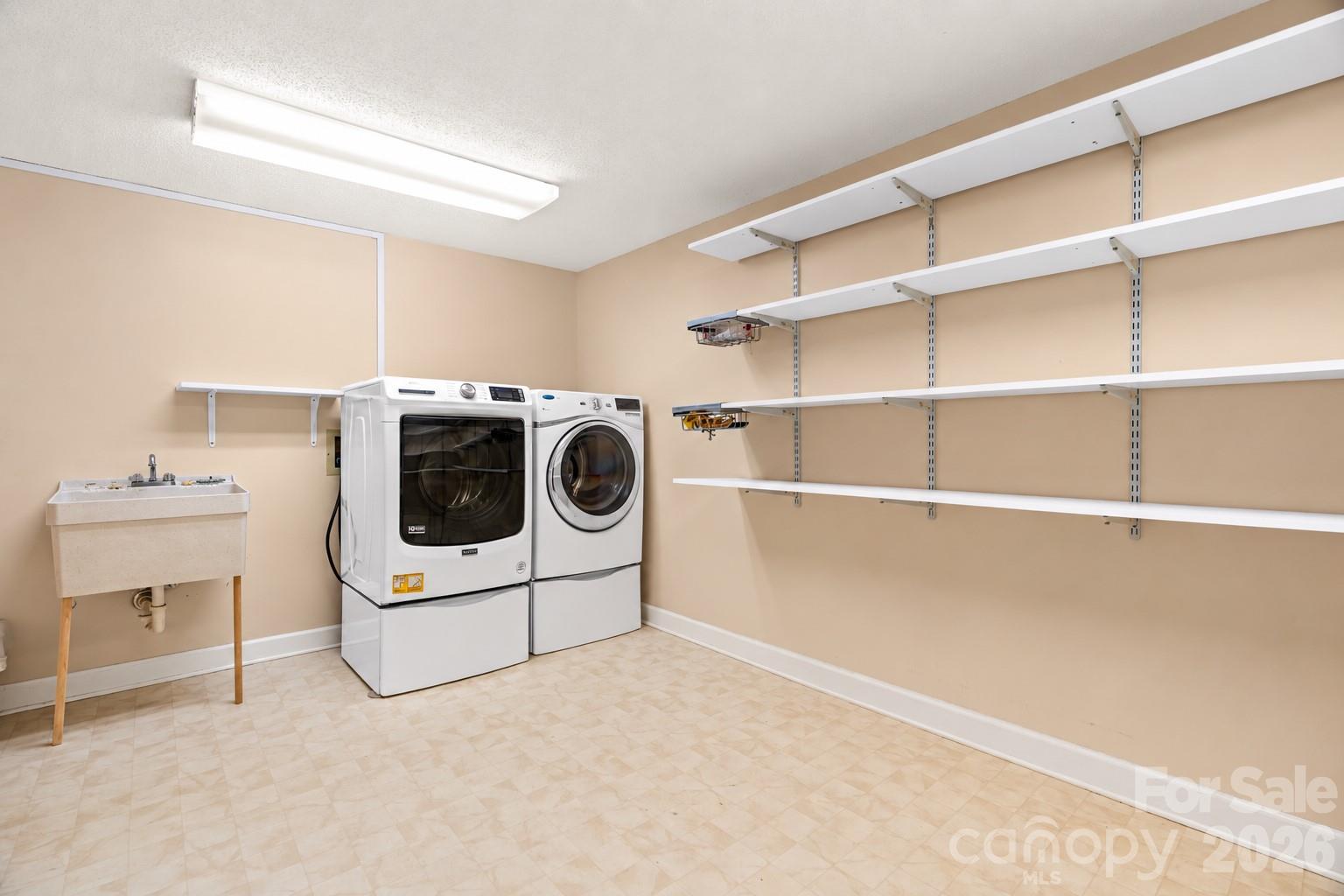 Lower level laundry room - 18 Northwood Road, Asheville