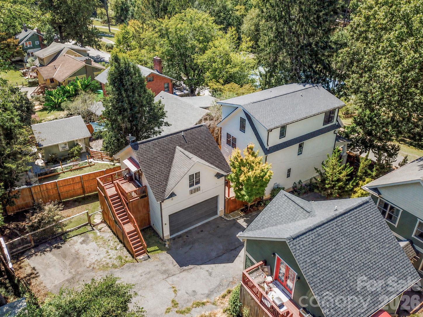 On a large lot, this home has plenty of parking - 92 Rumbough Place, Asheville