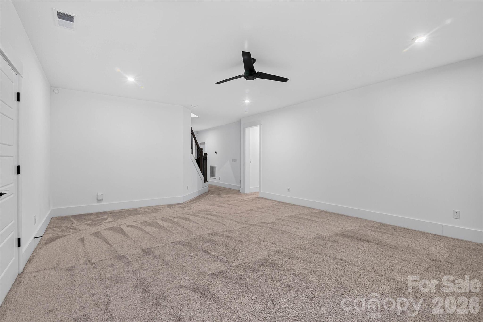 Bonus room, game room, teen suite, or home gym, this is not just a basement - 1216 Glade Arch Lane, Huntersville