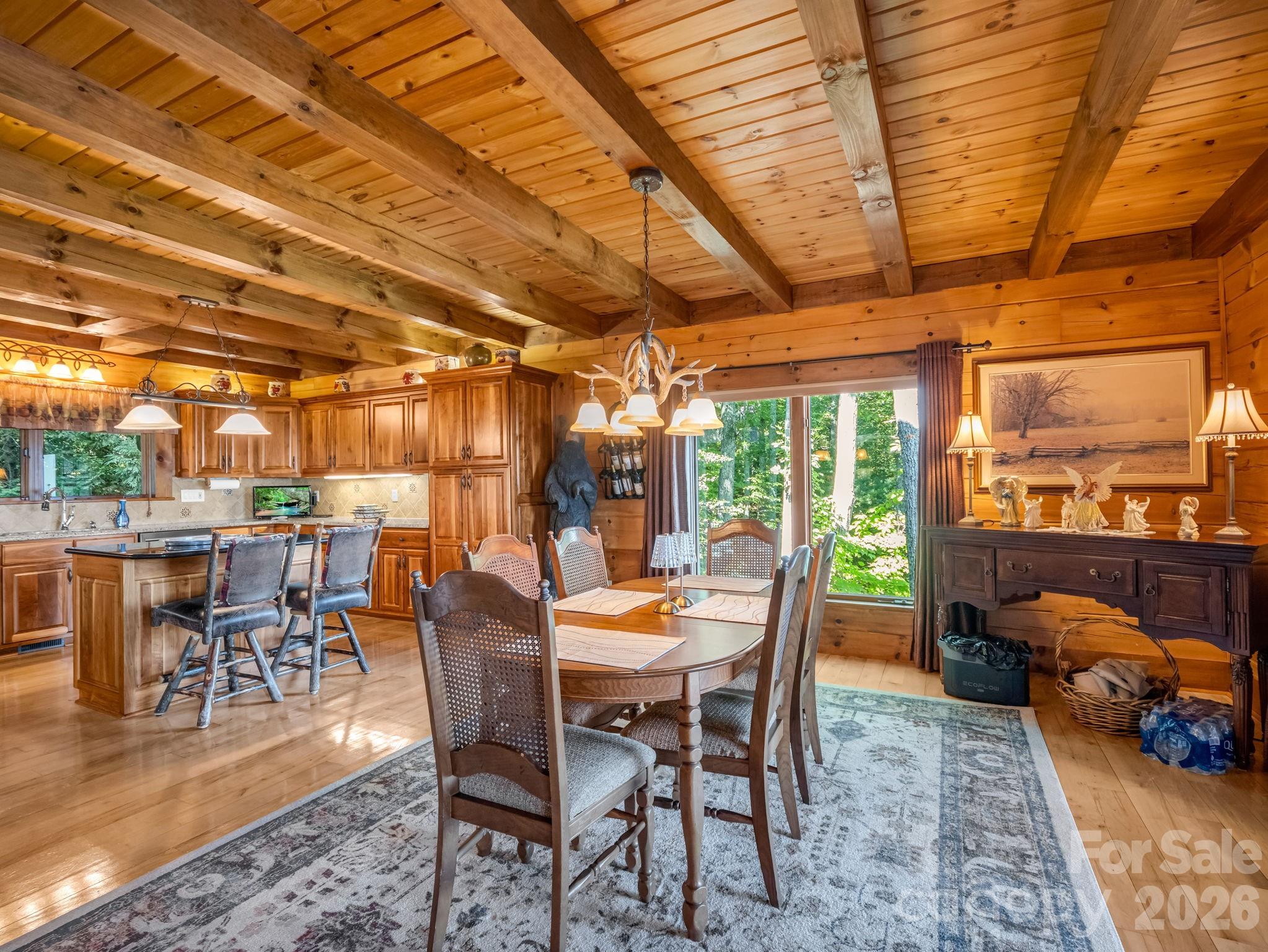 Dining room opens to kitchen and large deck - 5409 Mineral Springs Mountain Avenue, Valdese