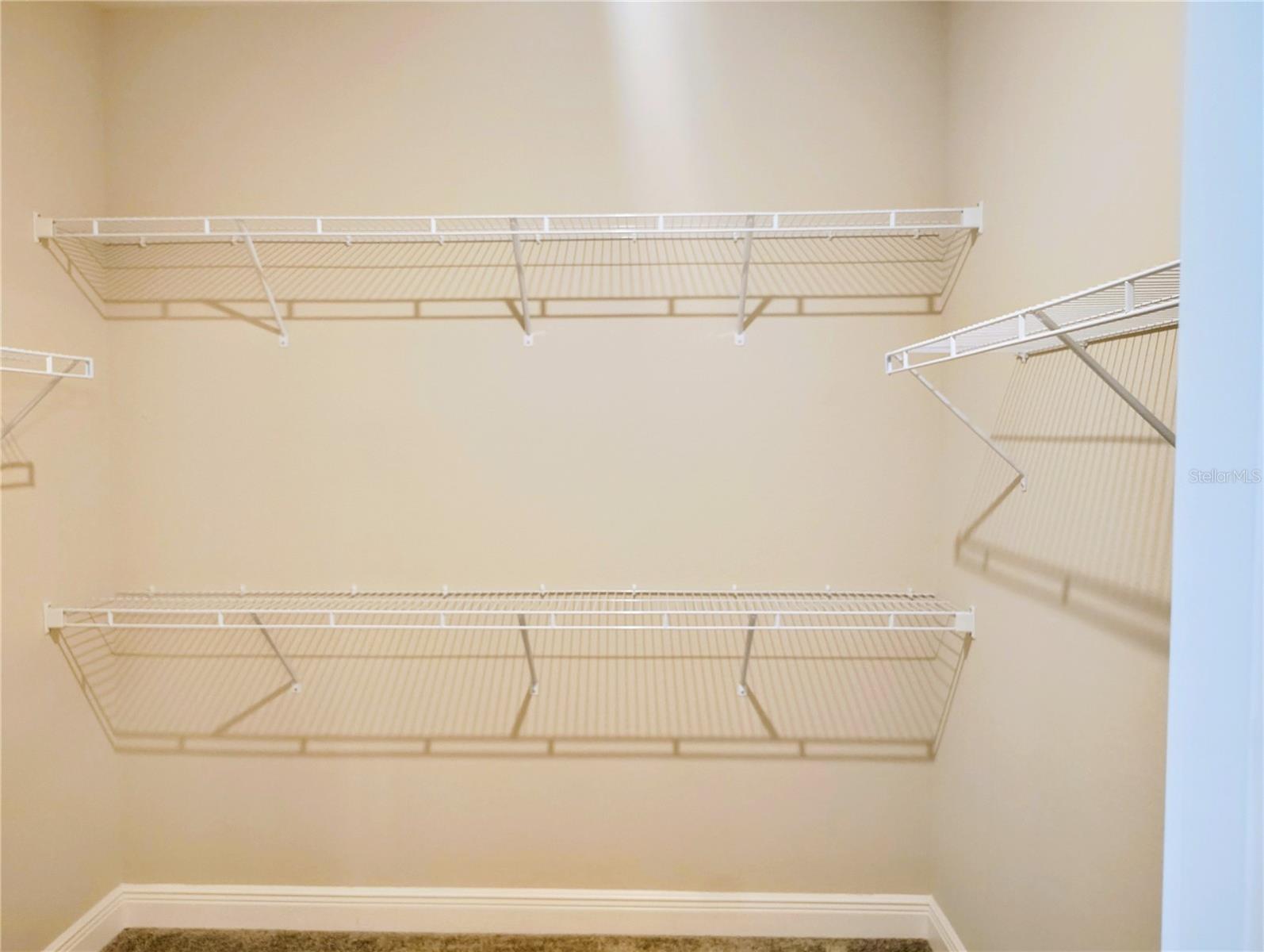Walk in closet/primary - 25171 DOREDO DR, PUNTA GORDA