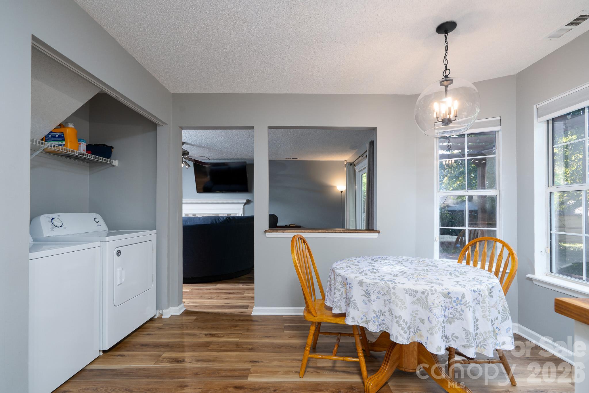 Laundry area + breakfast area - 14200 Lavender Trace Court, Charlotte