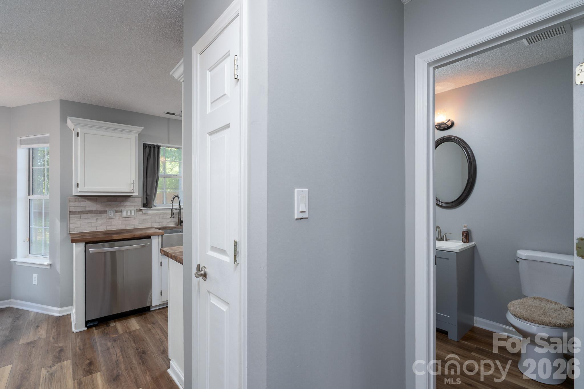 Half bathroom (downstairs) off kitchen - 14200 Lavender Trace Court, Charlotte
