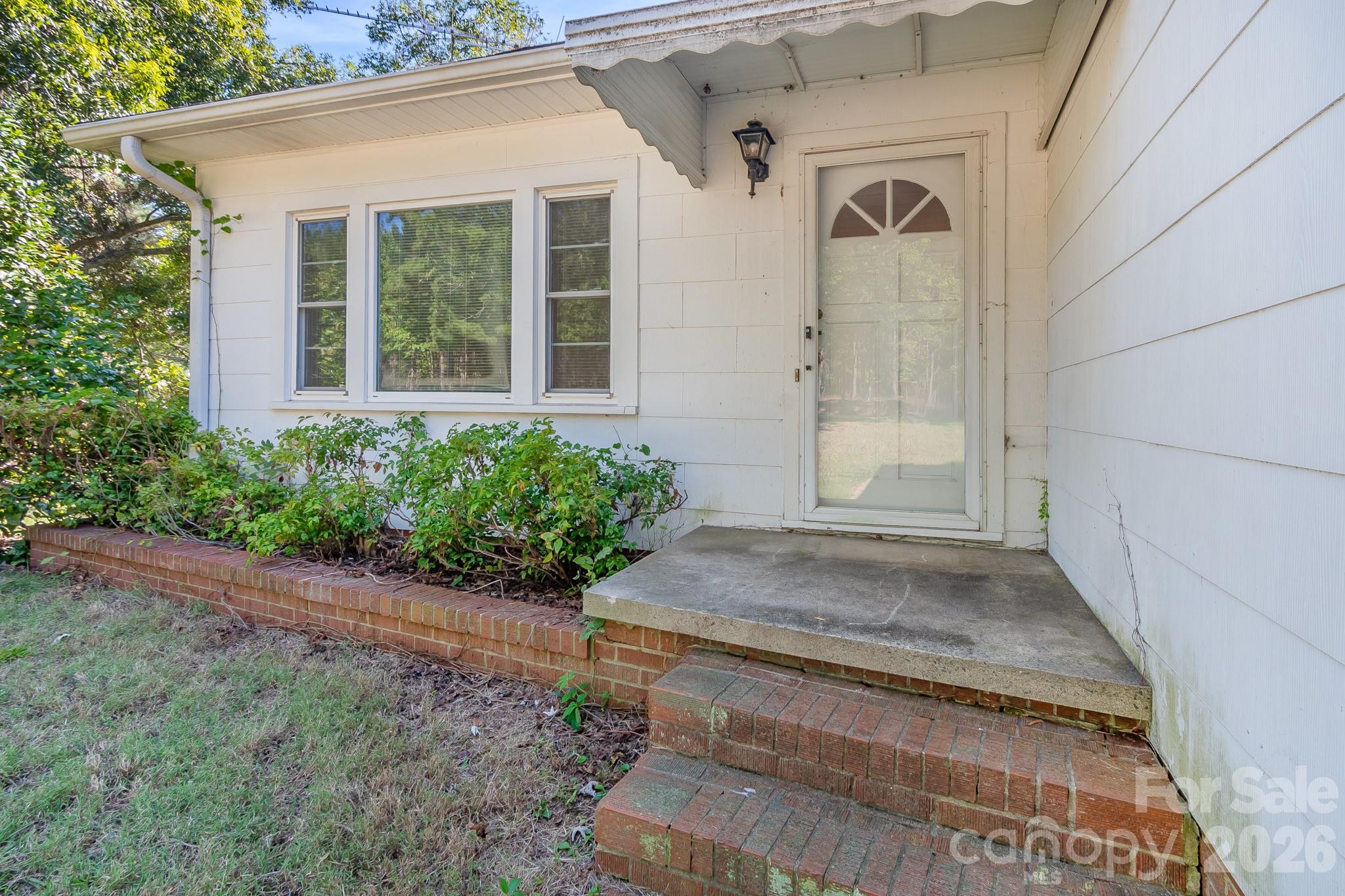 Front entry - 7615 S Rocky River Road, Monroe