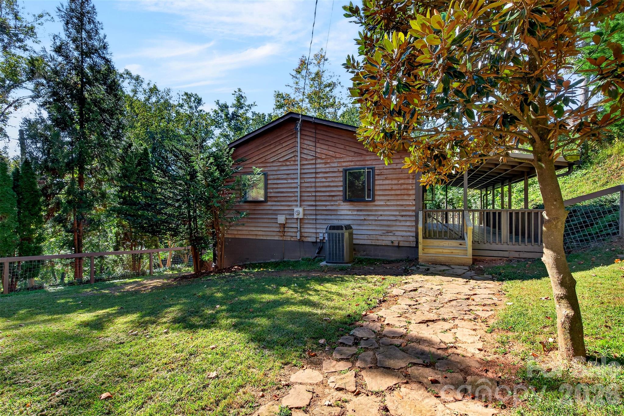 view from shed with hardscaping and mature trees - 53 Hemlock Street, Arden