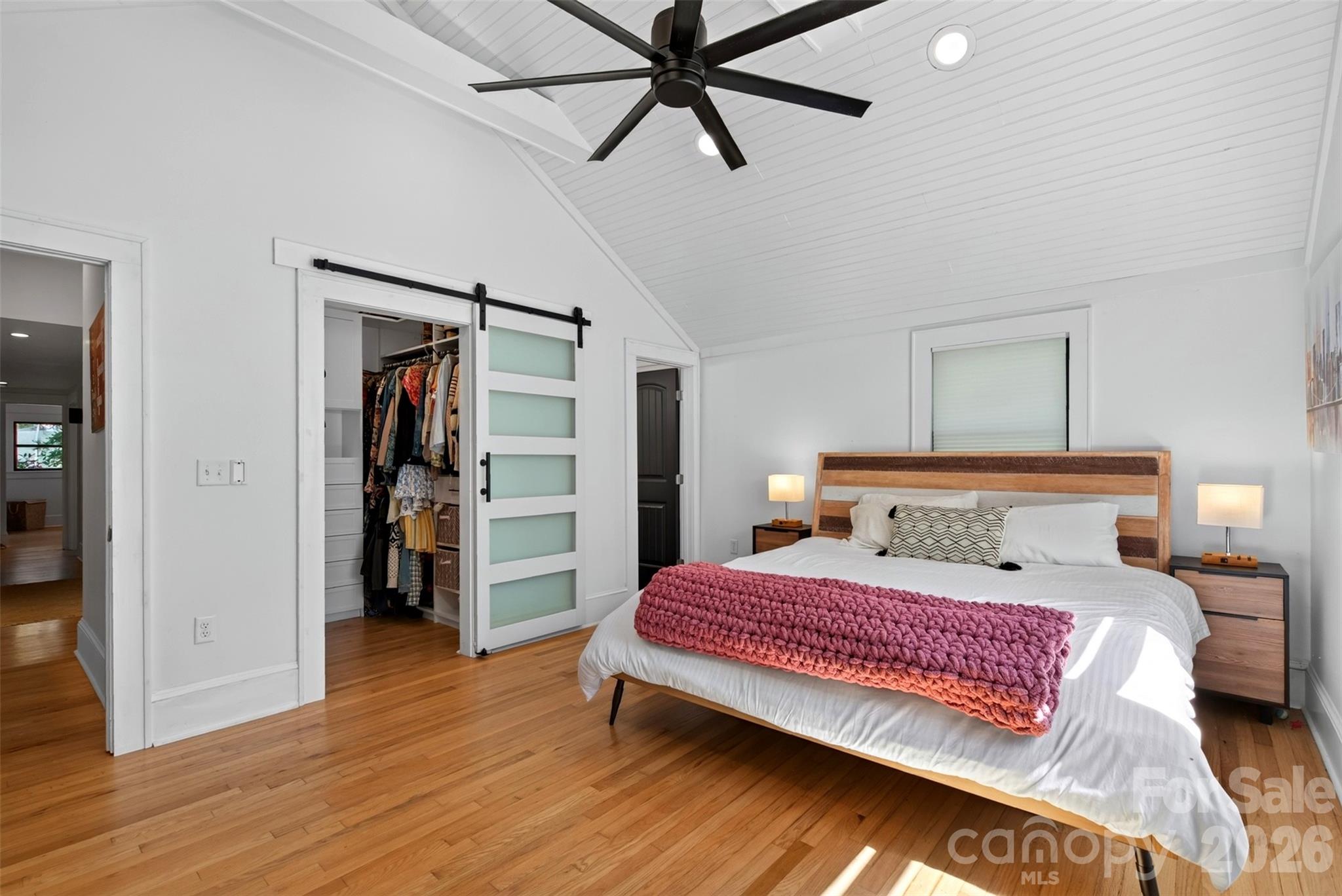 Primary bedroom ensuite with walk-in closet, and vaulted ceiling - 5 Inglewood Road, Asheville