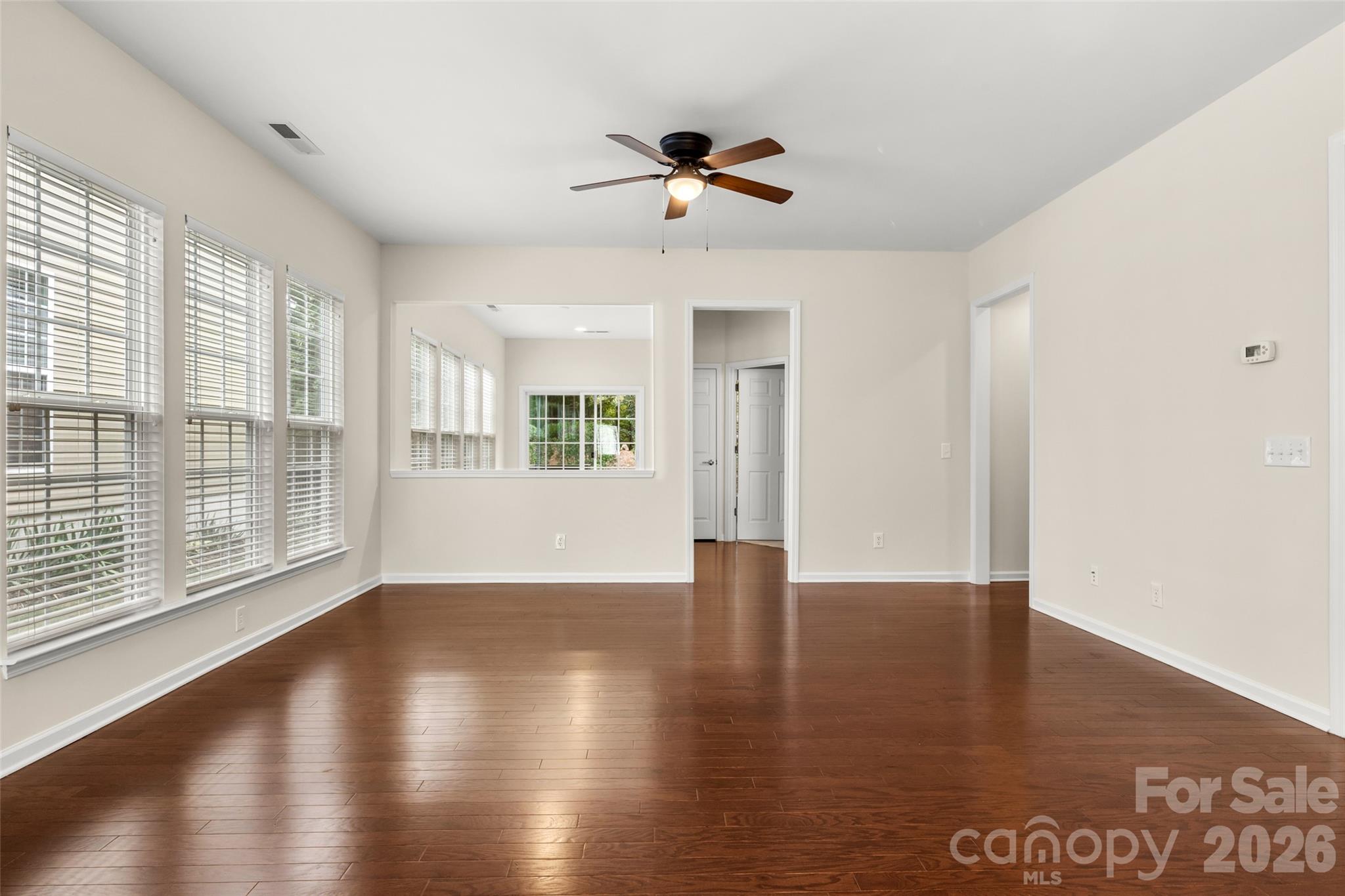 Gleaming hardwood floors in main living area - 9015 Smokey Hill Lane, Indian Land