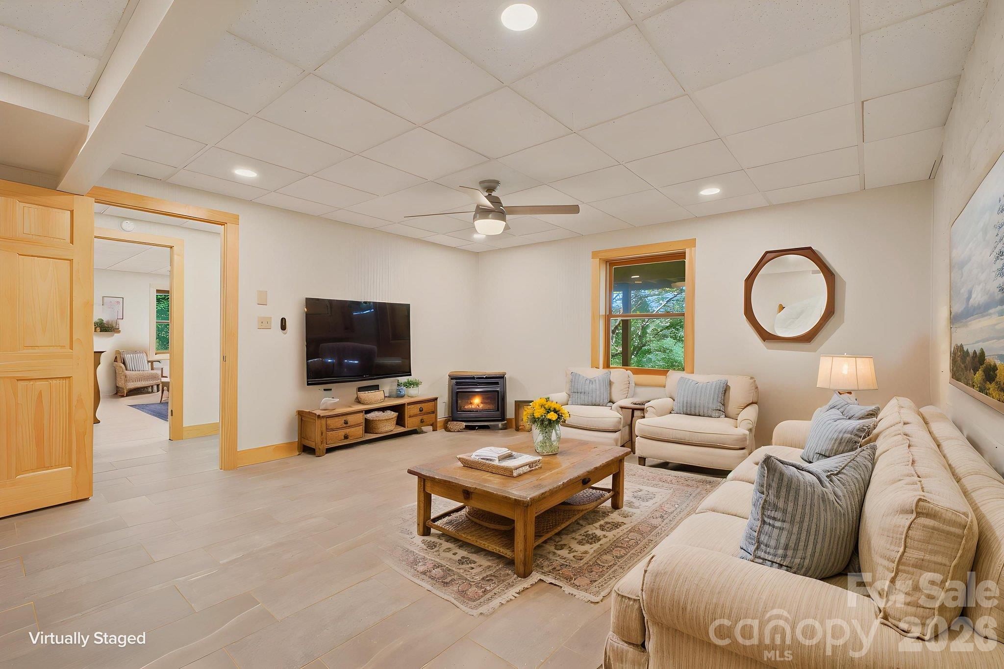 Furnishings Virtually Staged for lower level living room - 2711 Rabbit Hop Road, Spruce Pine