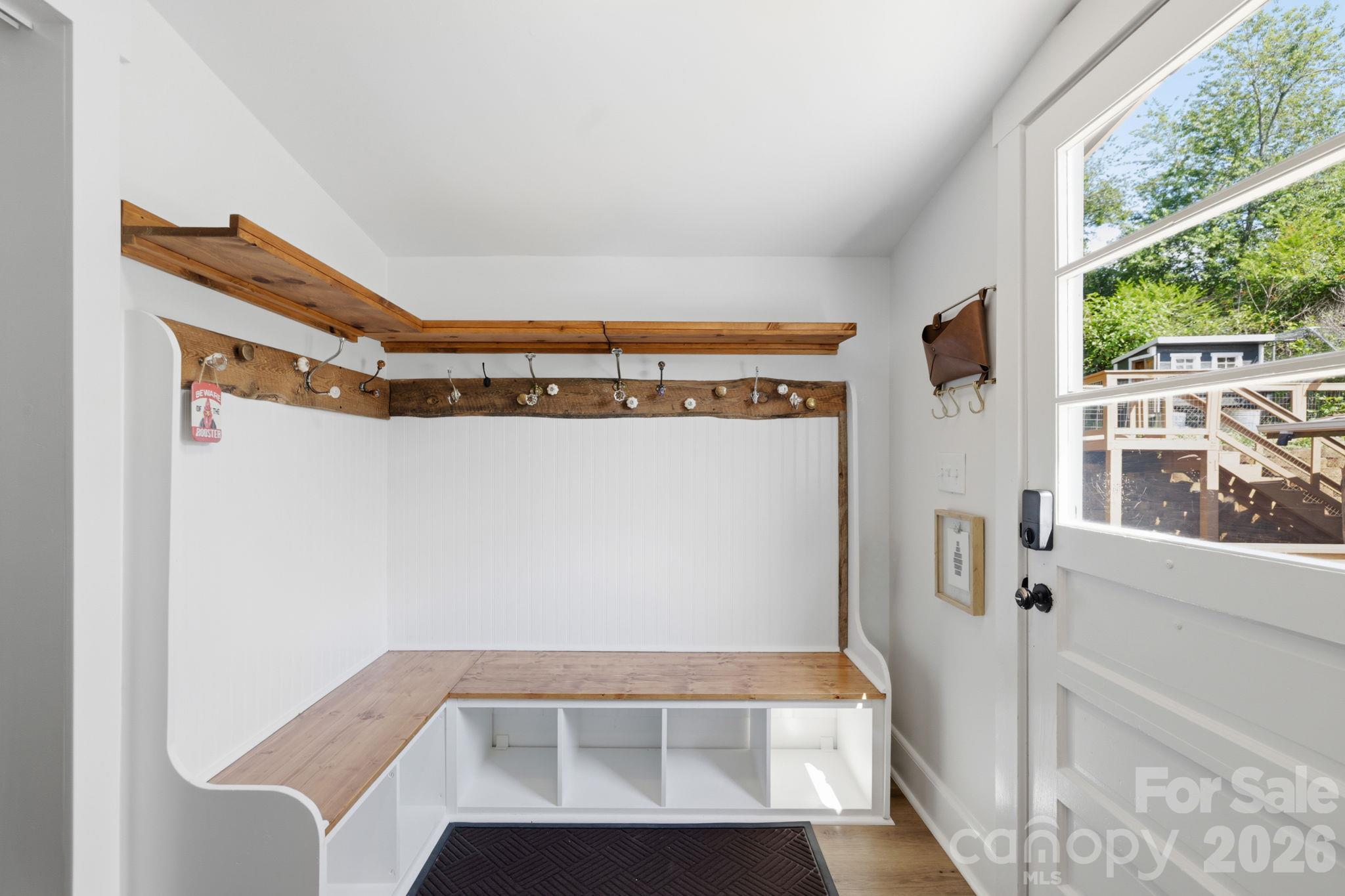 Convenient coat and shoe storage off back porch - 2252 Riceville Road, Asheville
