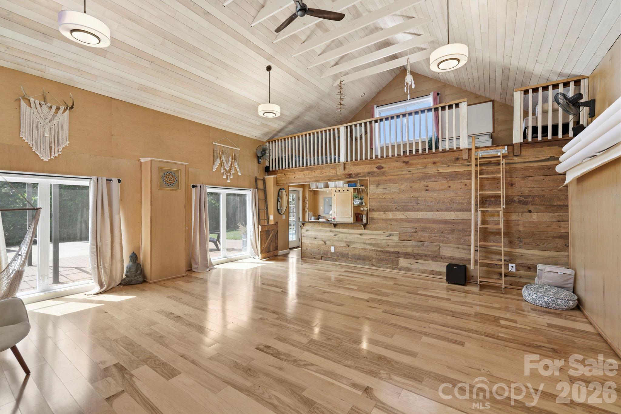 Lofted main room in ADU currently used as dance studio with sprung dance floor - 2252 Riceville Road, Asheville