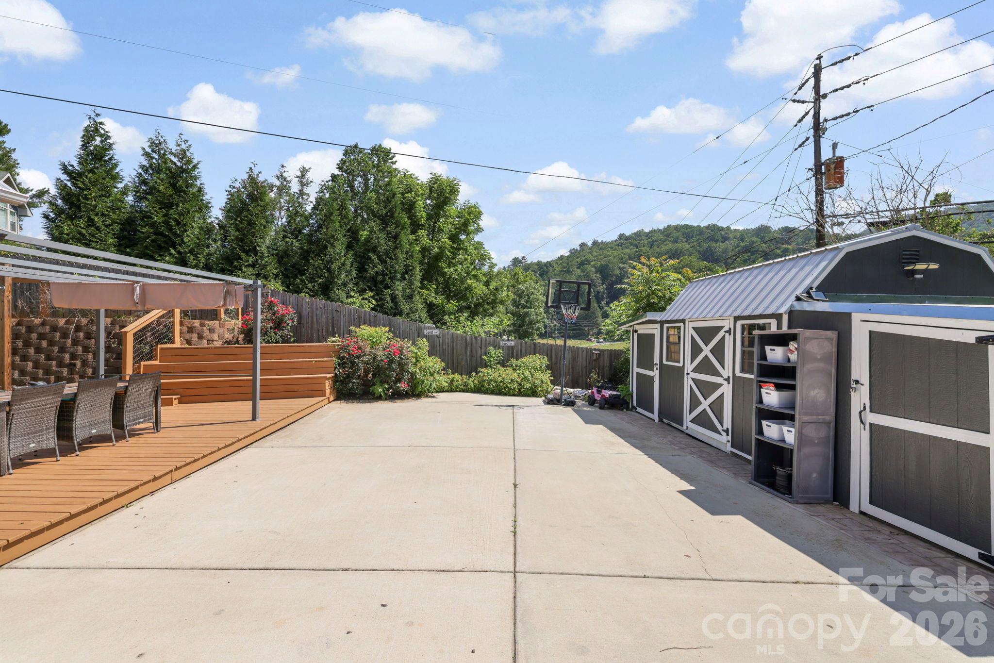 Plenty of room in the shed for lawn equipment and bear-proof garbage storage - 2252 Riceville Road, Asheville