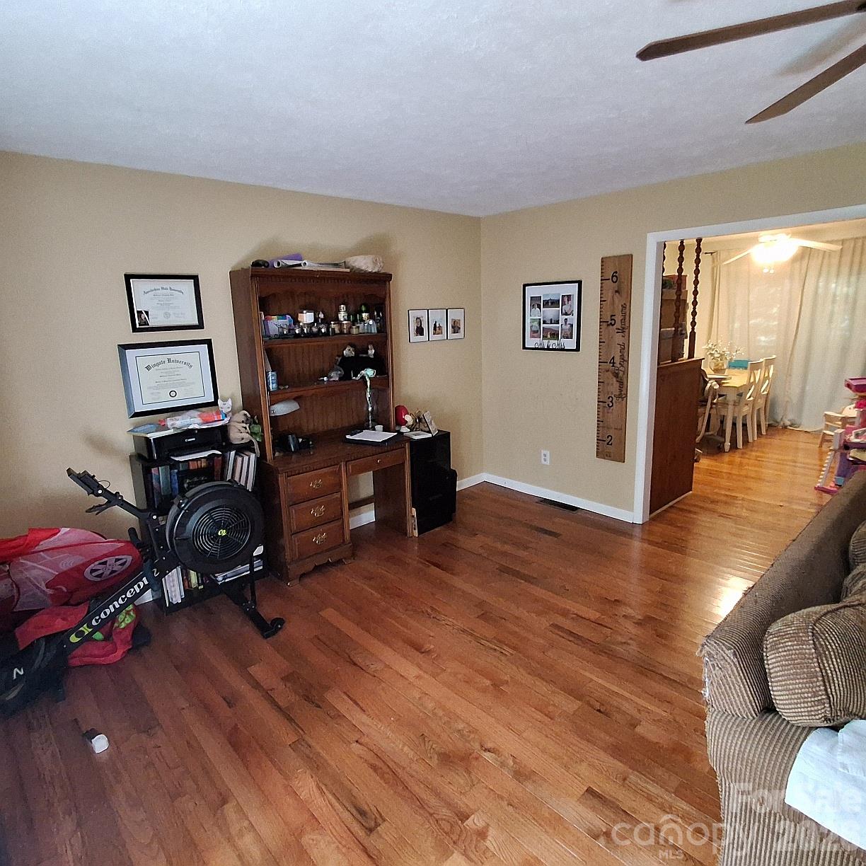 Living room is large enough for additional dining or office space - 173 Pinecrest Drive, Alexander