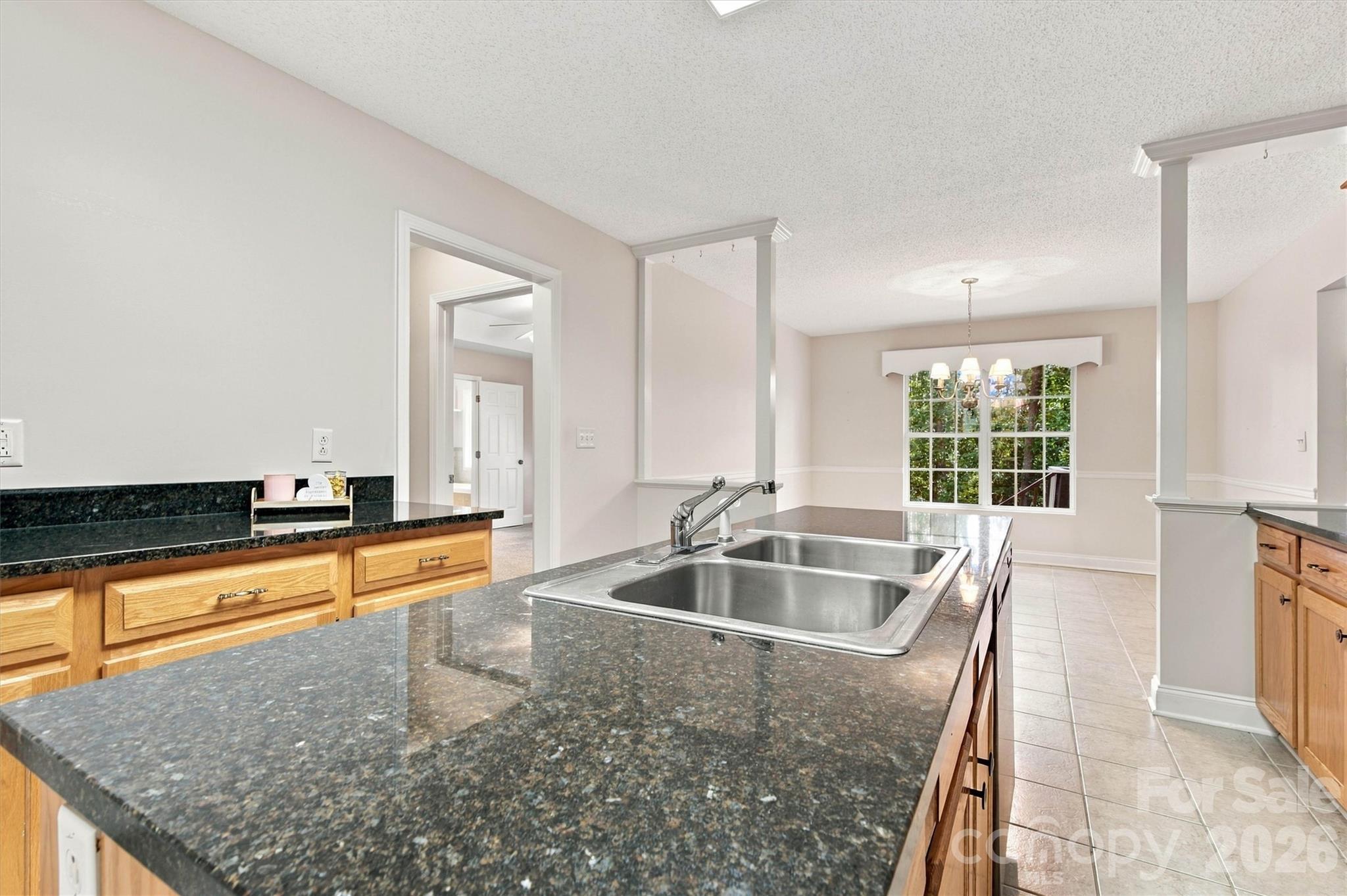 Focused Kitchen Island/Informal Dining Area View - 3656 Woodgreen Drive, Lincolnton