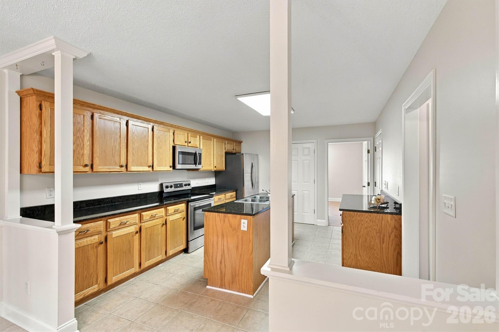 Focused Kithen/Formal Dining Entry View with Walk-In Pantry - 3656 Woodgreen Drive, Lincolnton