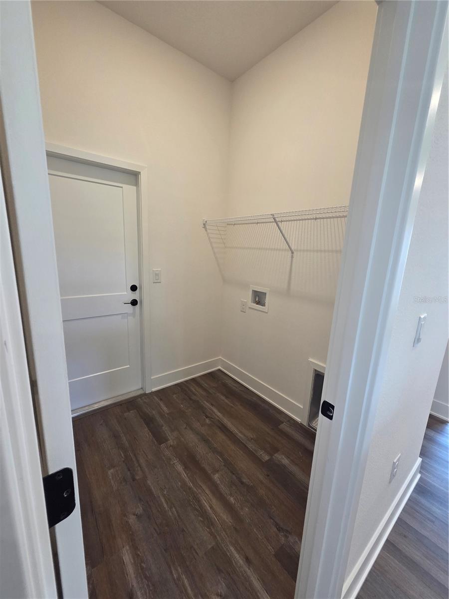 laundry room - 9393 HIGHLAND HILLS DR ST, HUDSON