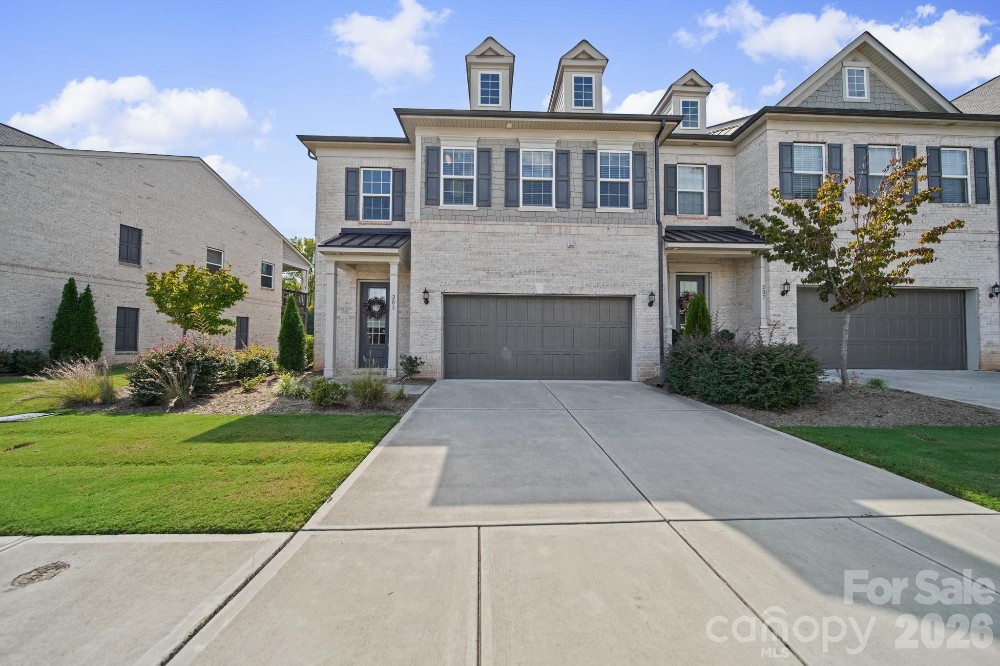 Front, with a double garage - 203 Heathbrook Lane, Waxhaw
