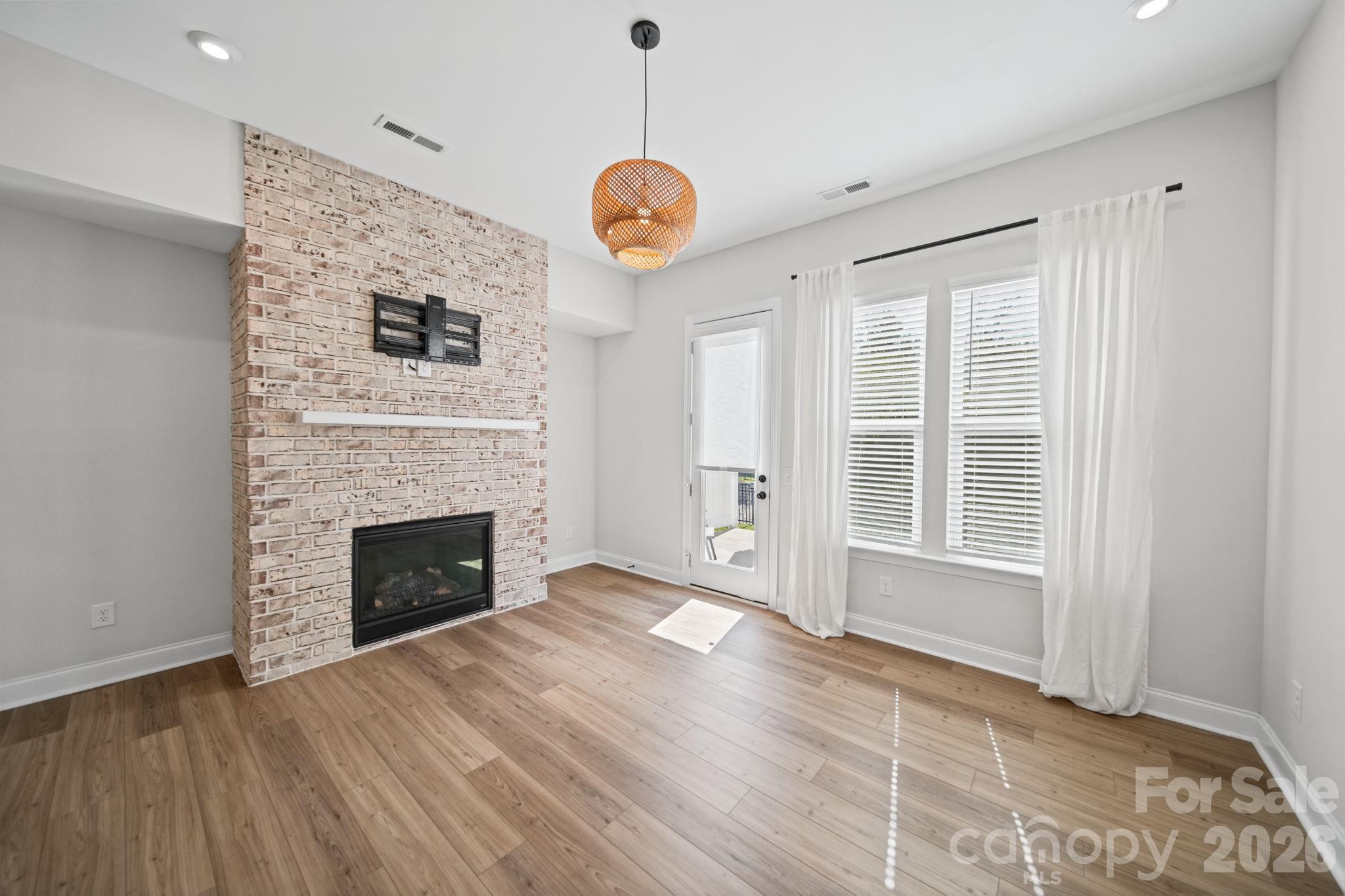 Livingroom w/gas fireplace, Main floor - 203 Heathbrook Lane, Waxhaw
