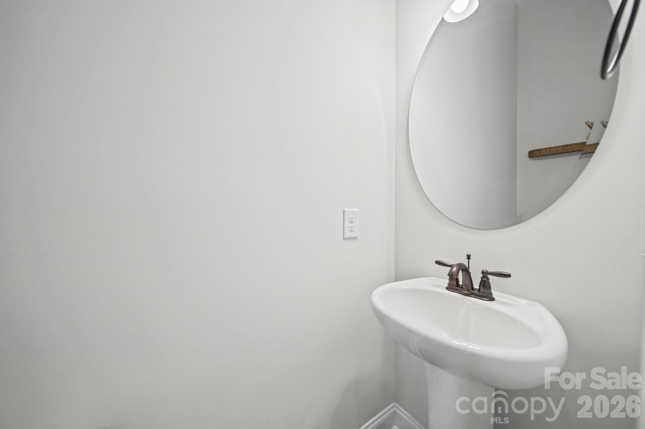main floor half bathroom - 203 Heathbrook Lane, Waxhaw