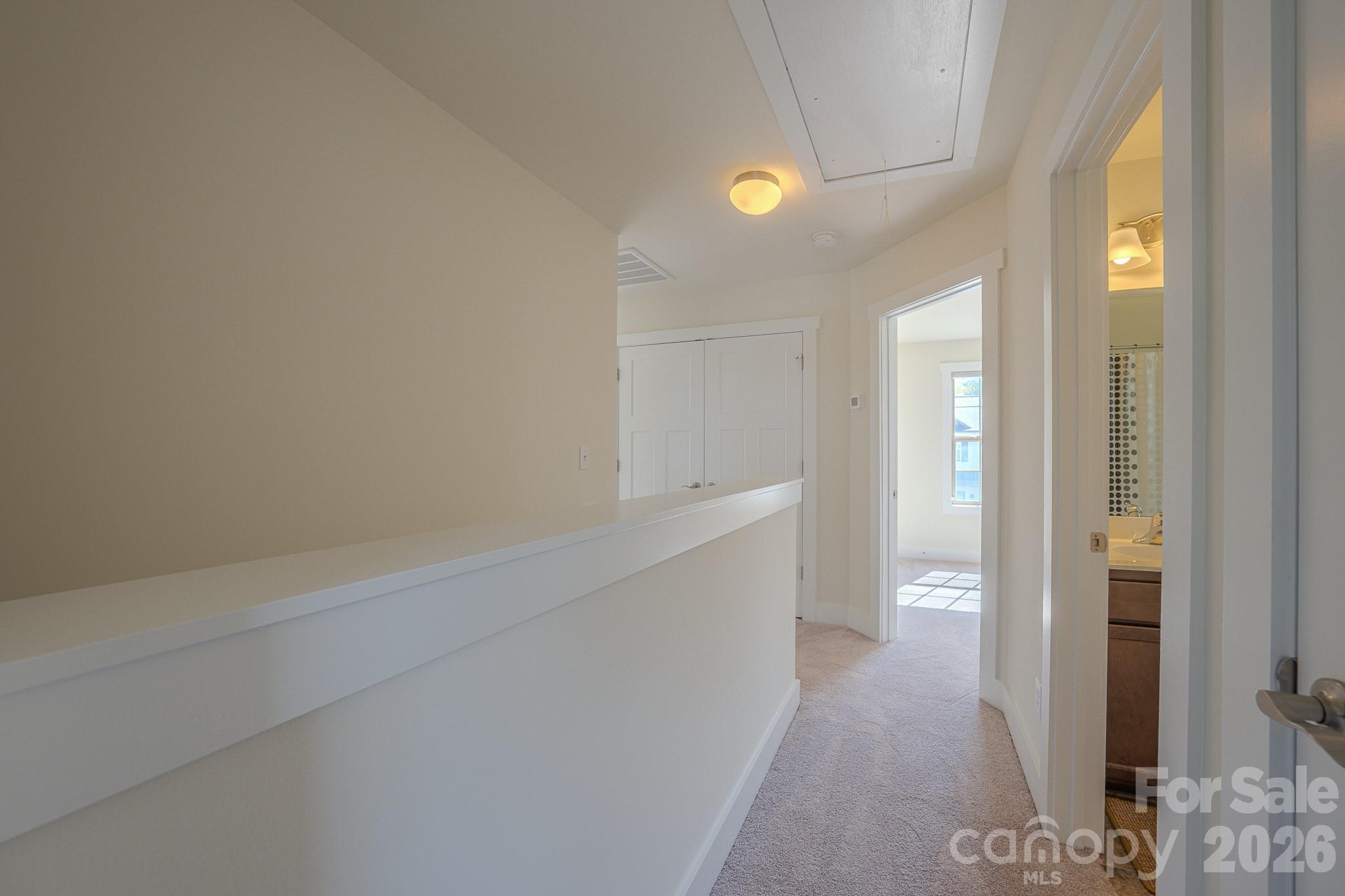 Hall from bedroom 1 to full bathroom on right - 623 Cardwell Lane, Fletcher