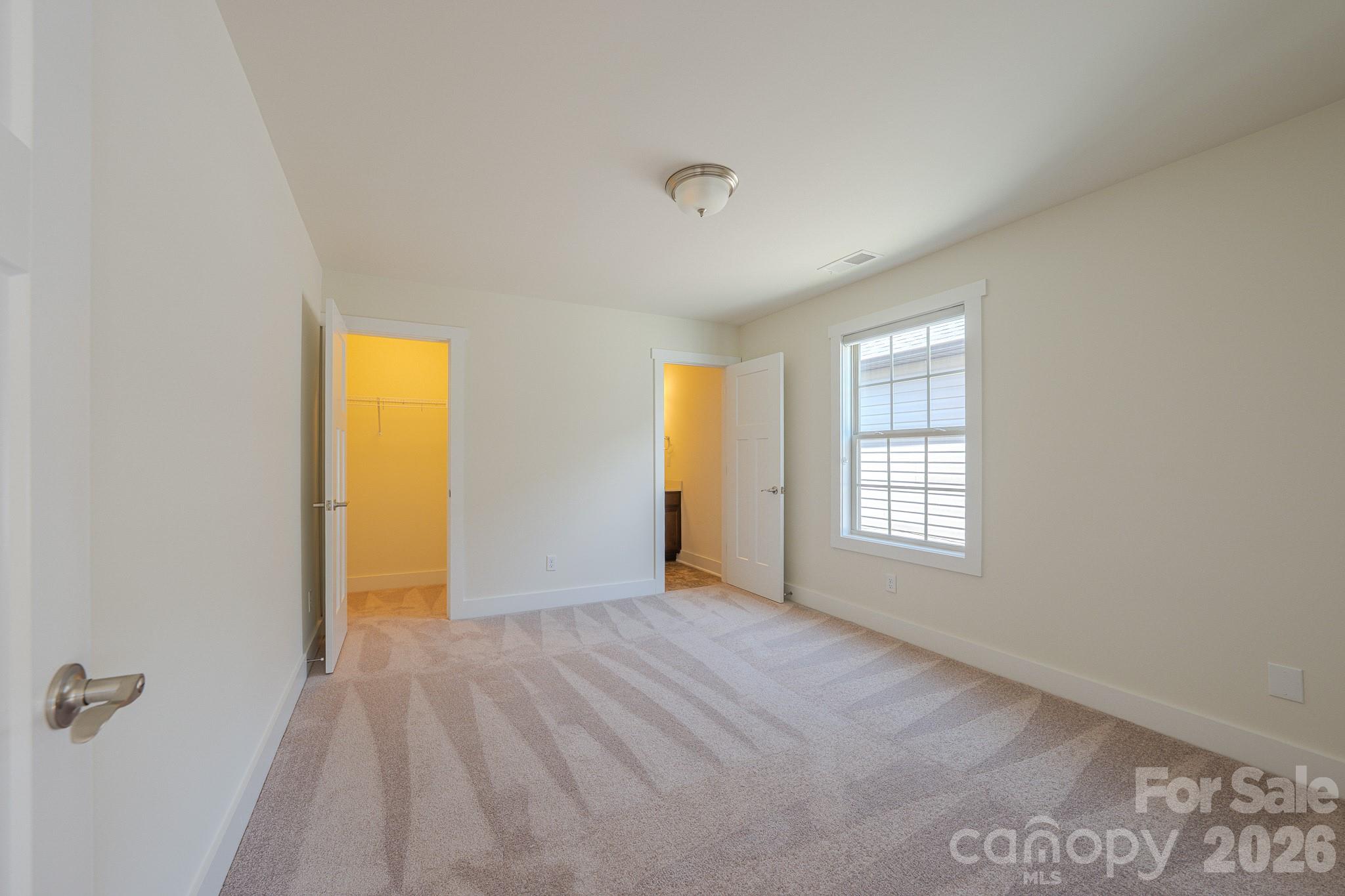 Primary Bedroom with walk in closet - 623 Cardwell Lane, Fletcher