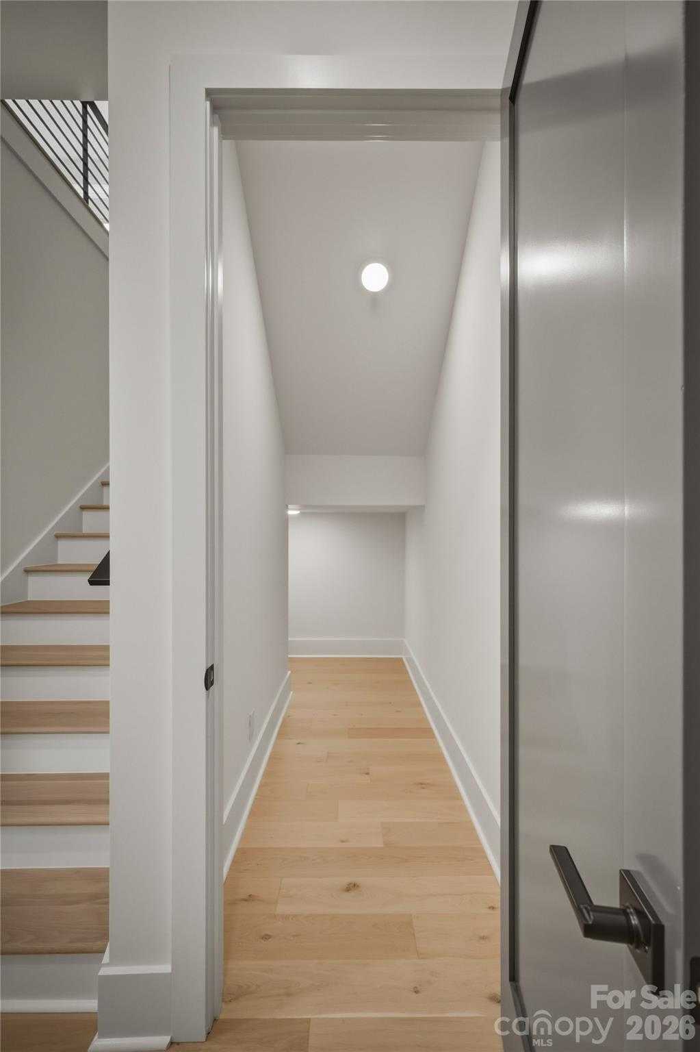 Before heading upstairs, take a peek into the very large and deep closet for tons of surprise storage. - 2303 Paddock Circle, Morganton
