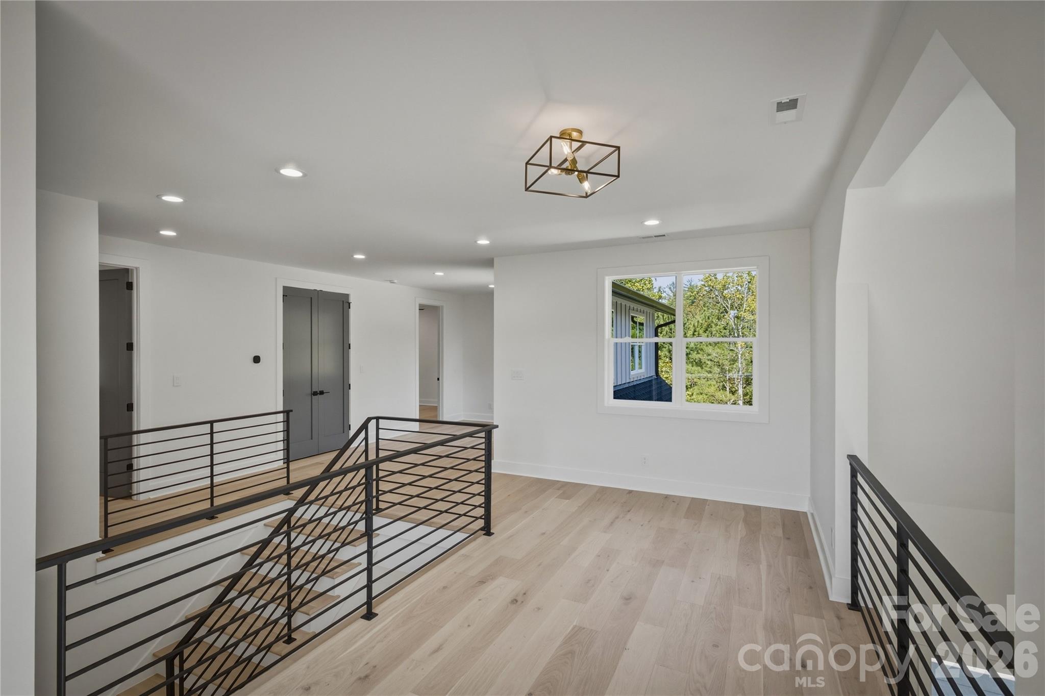 There is also a 2nd space in the loft where you might tuck a desk if you like or use it as a flex space. - 2303 Paddock Circle, Morganton