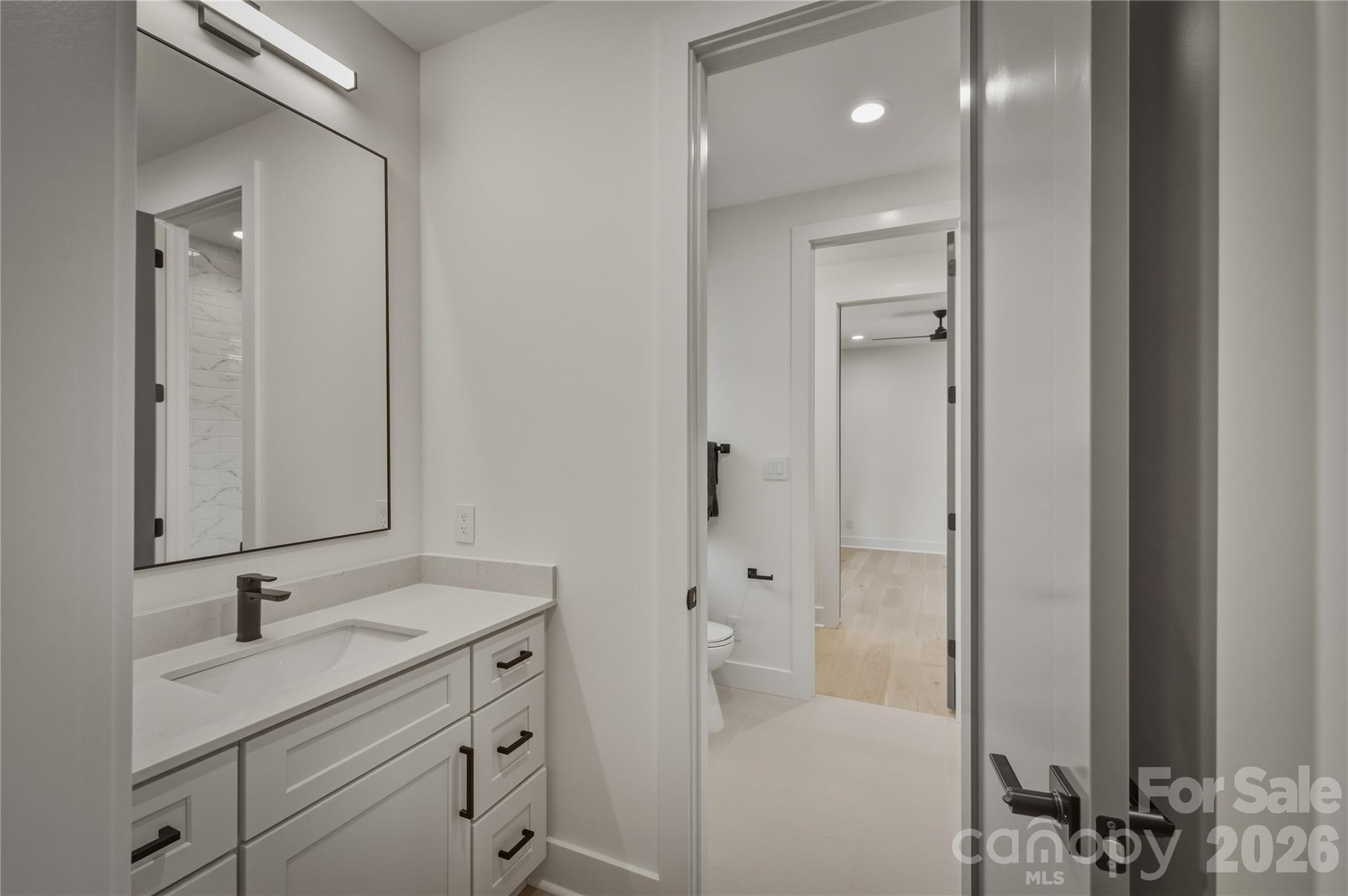 This is the private sink and vanity for Suite #2. - 2303 Paddock Circle, Morganton
