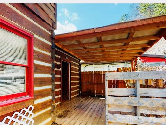 Covered deck in back is absolutely inviting fullwitj opportunities ! - 1456 Dellwood Road, Waynesville