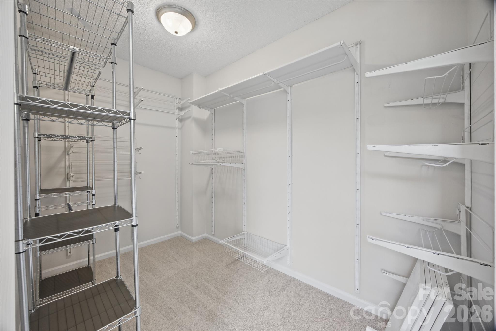 Primary Walk In Closet - 12600 Parks Farm Lane, Charlotte