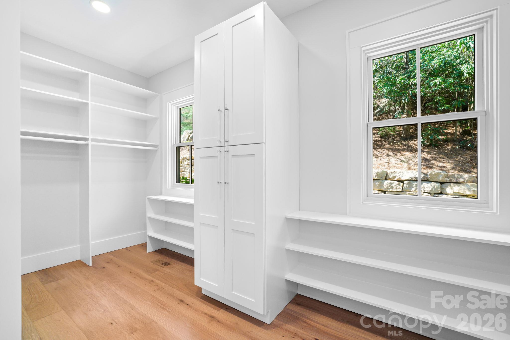 Primary walk-in closet - 95 Cardinal Trace, Lake Toxaway