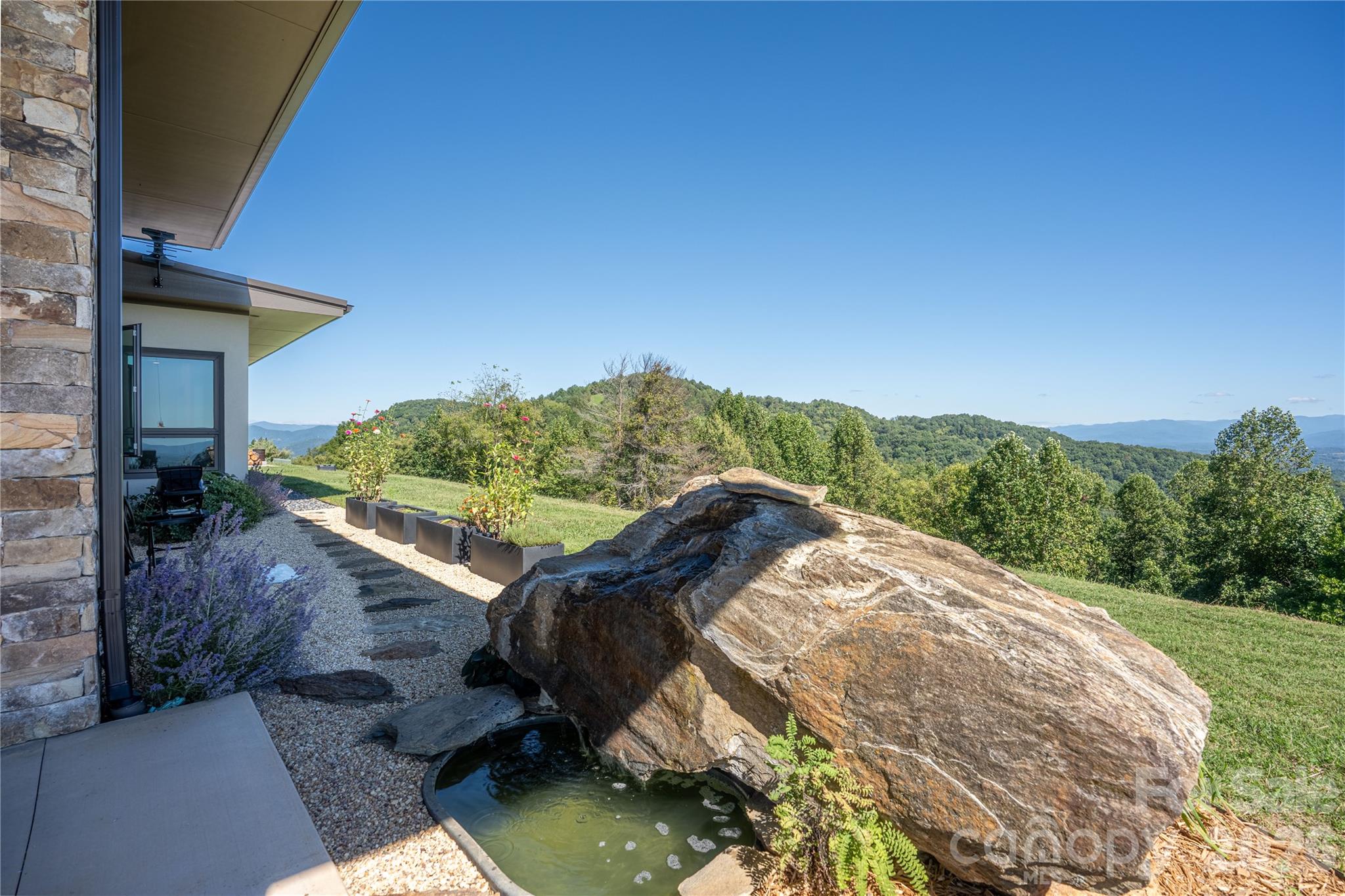 Main House-Outdoor Rock Fountain - 1045 & 1047 Graham Road, Marshall