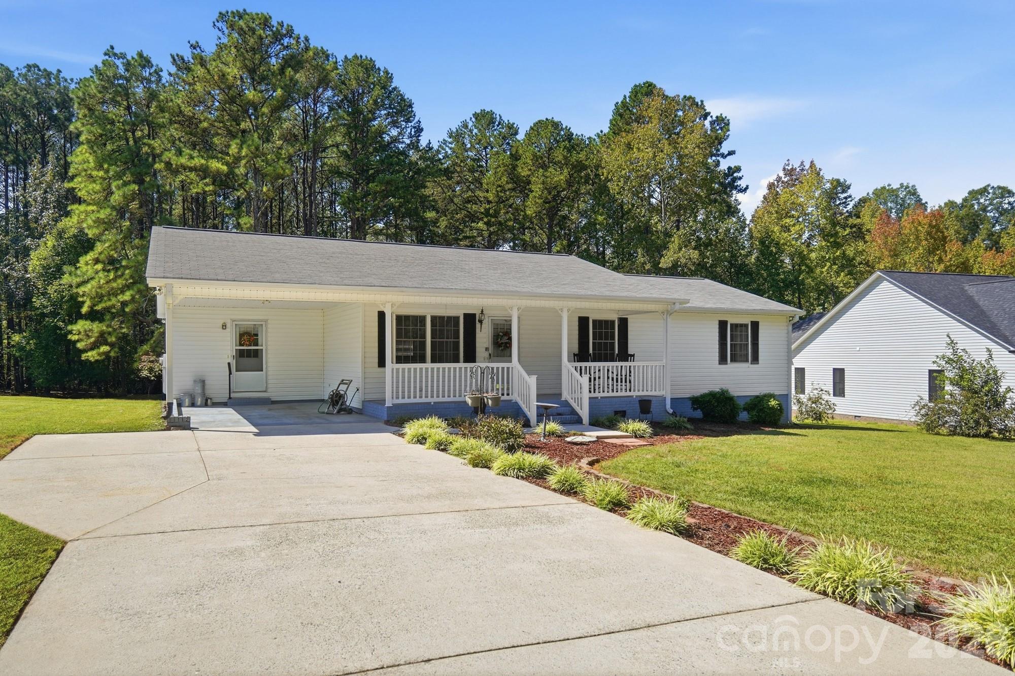 Single Family Residence at 1037 Cross Creek Drive, Oakboro, photo 2 of 37