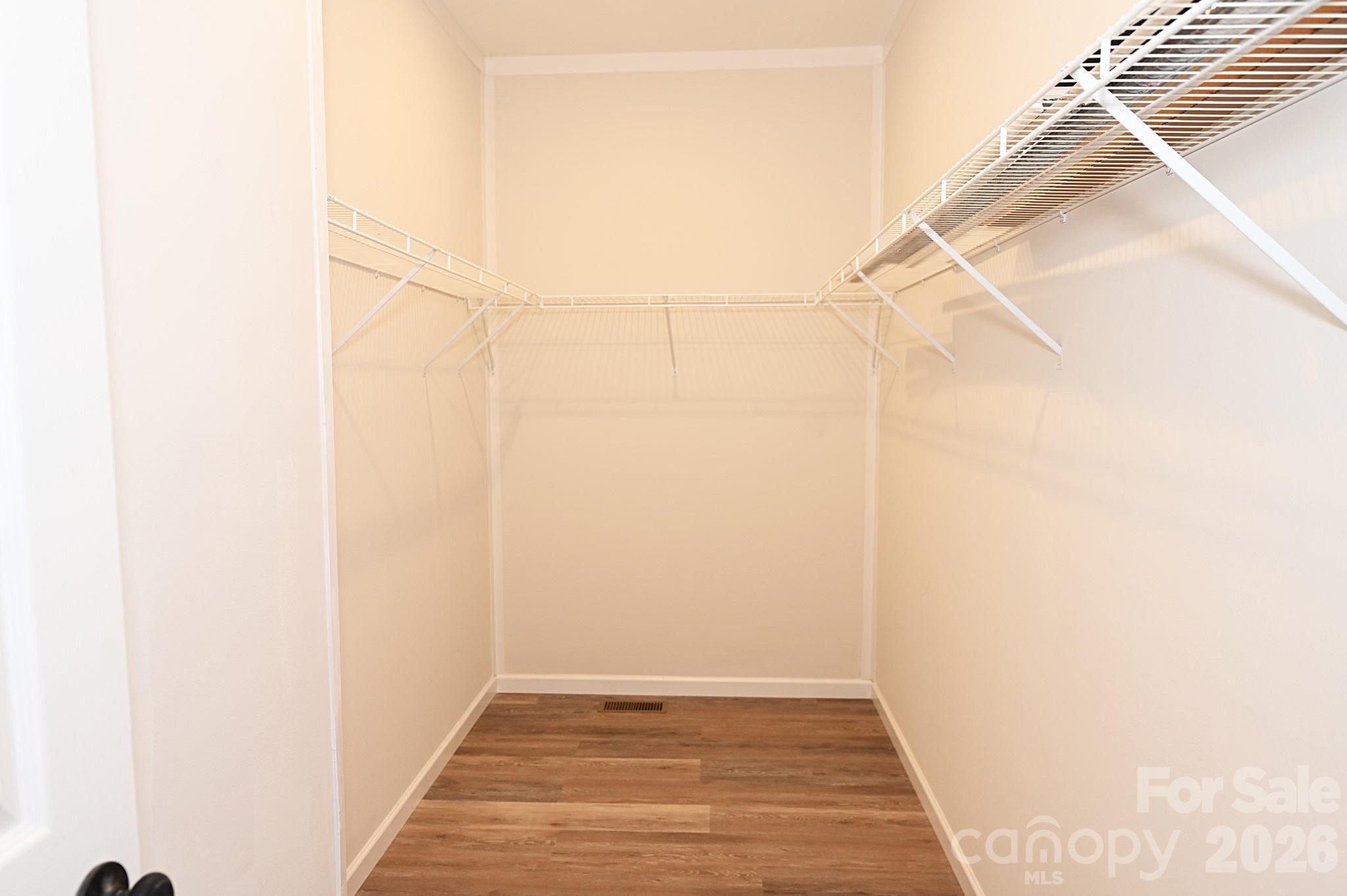 Primary closet - 2026 Windigo Street, Newton