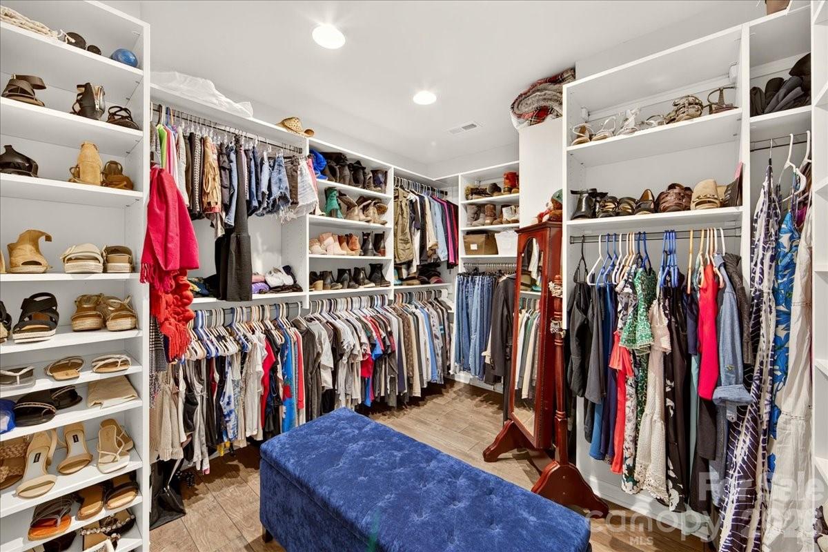 Custom design walk in closet in primary suite - 3093 Hartson Pointe Drive, Fort Mill