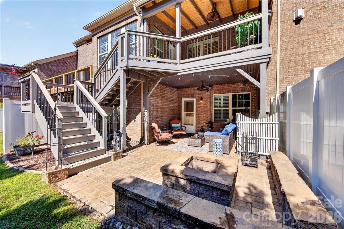 Spectacular outdoor living space, this is a double decker with new stairway connecting you to the outdoor living environment back ups to private wood area - 3093 Hartson Pointe Drive, Fort Mill