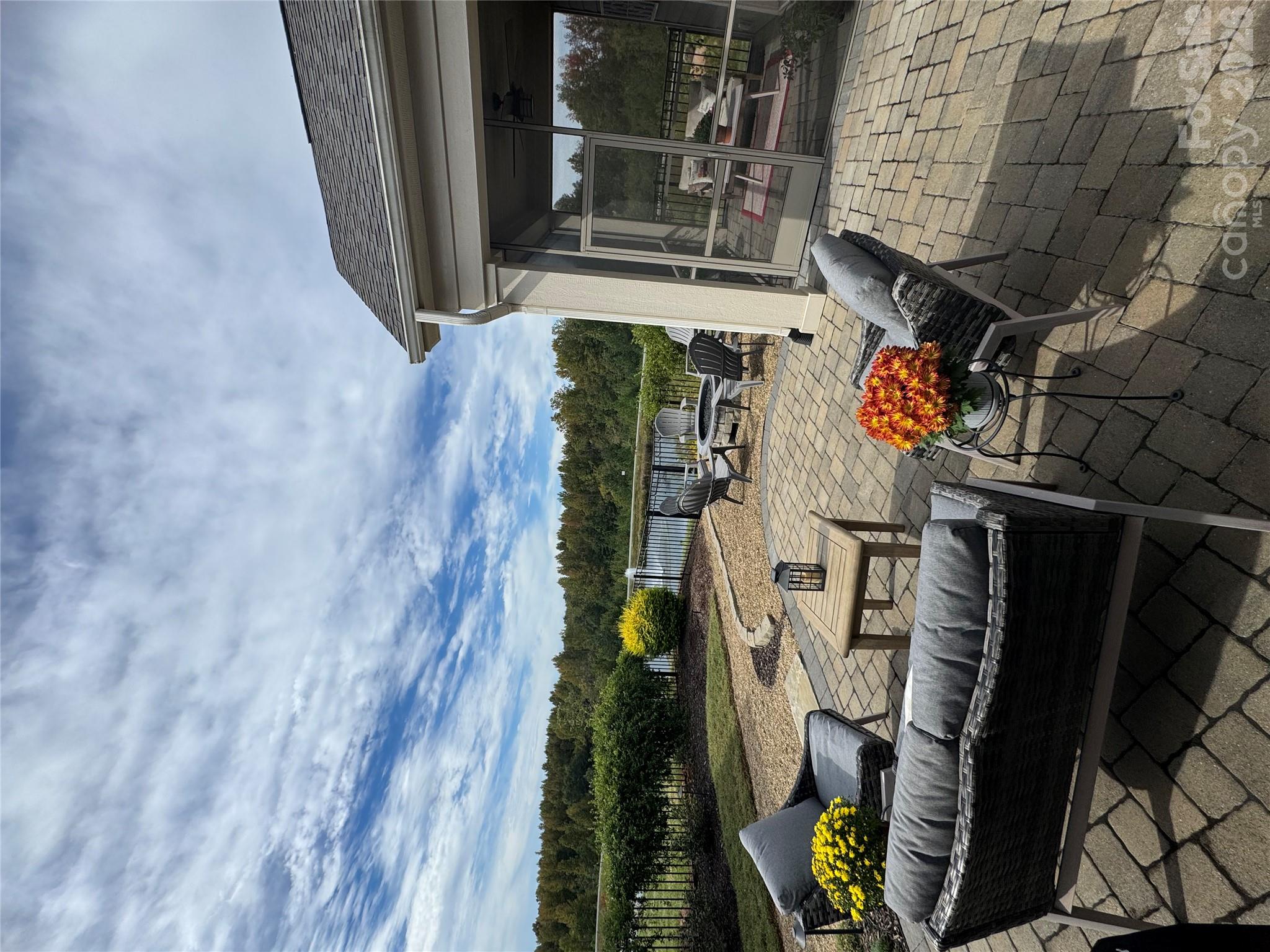 Perfect place for relaxation or entertaining in your beautiful manicured courtyard with vast views of water features - 9065 Treetop Way NW, Concord