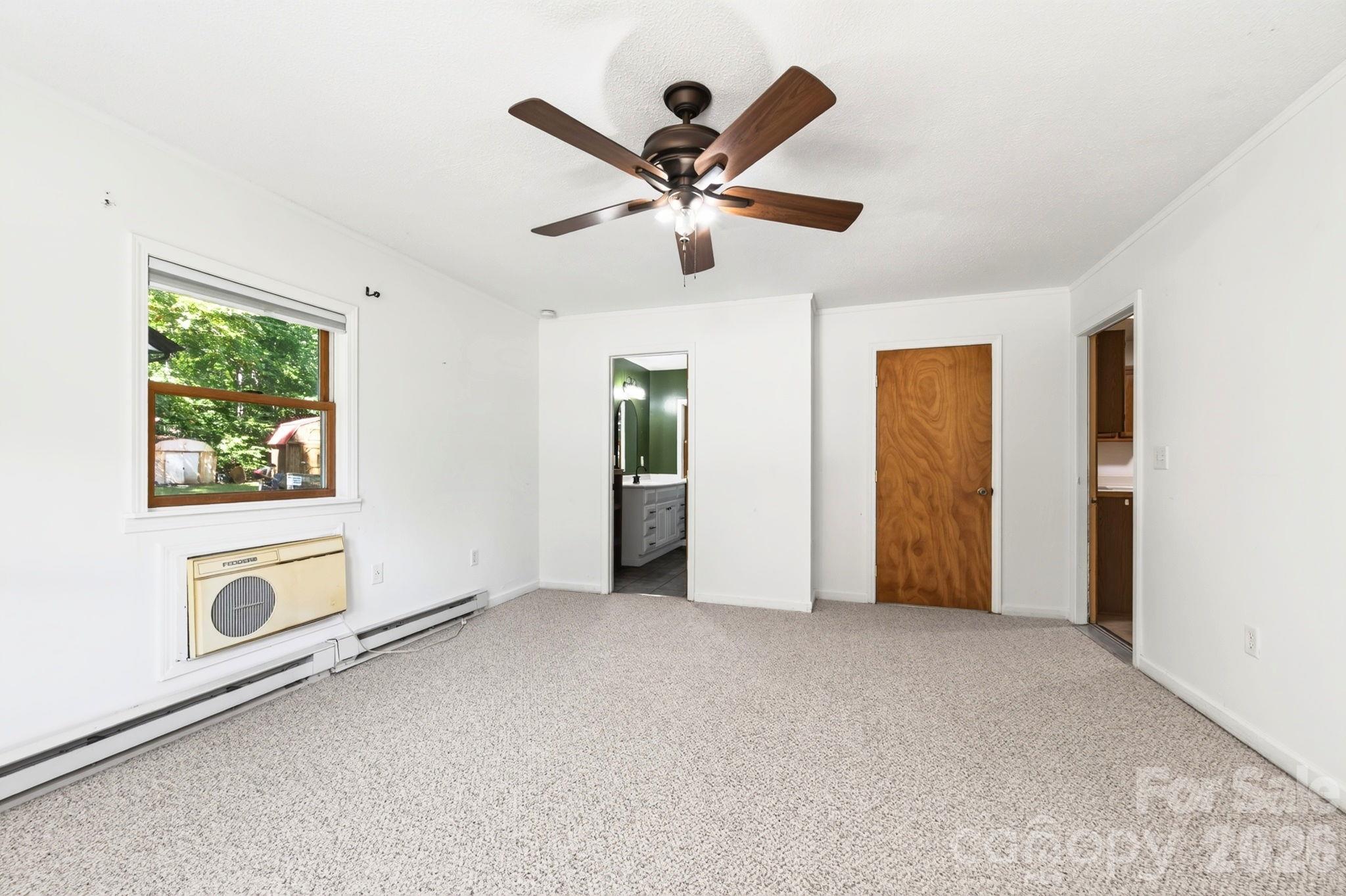 Primary Bedroom with Walk-in Closet - 340 Genesis Circle, Black Mountain