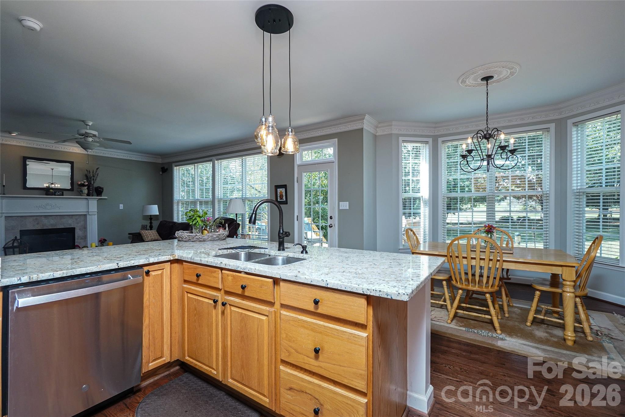 Kitchen view into Family Room - 8120 Glamorgan Lane, Matthews
