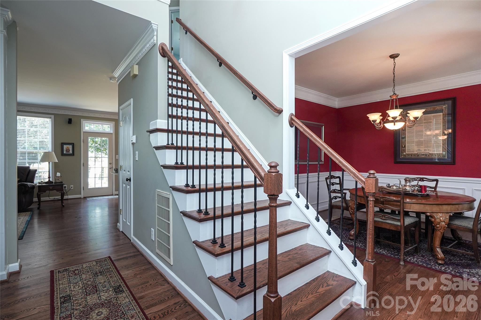 Stairs in 2 Story Foyer - 8120 Glamorgan Lane, Matthews