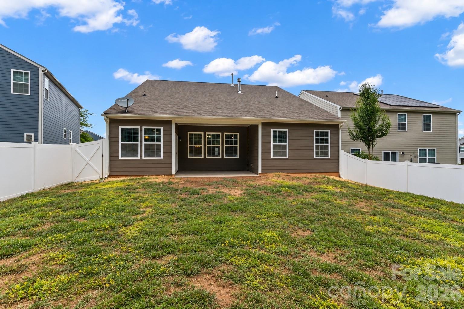 Covered porch and fully fenced back yard - 188 Cherry Birch Street, Mooresville