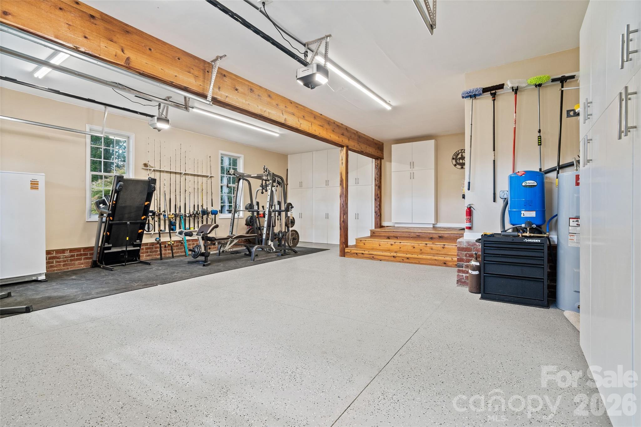 Heated and cooled garage with epoxy flooring and cedar accents [32.7ft x 27ft] - 996 Beamguard Road, Clover