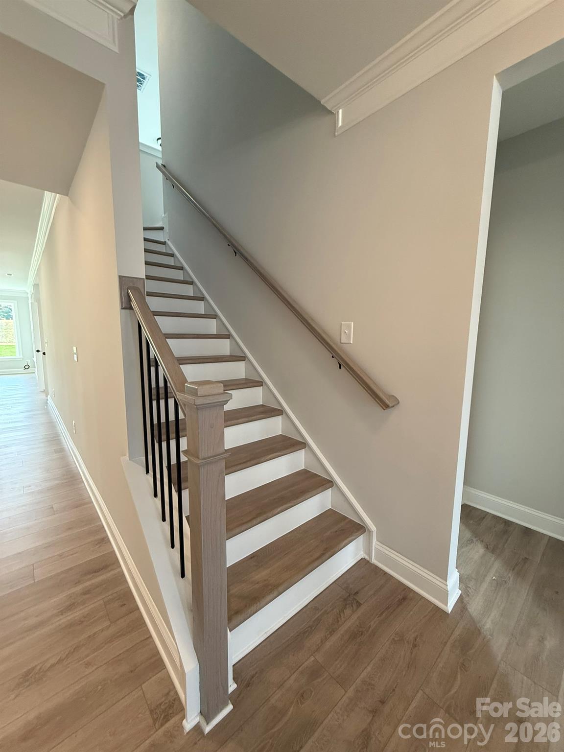 Stairs to upper level - 4481 Blue Mound Court, Stanley