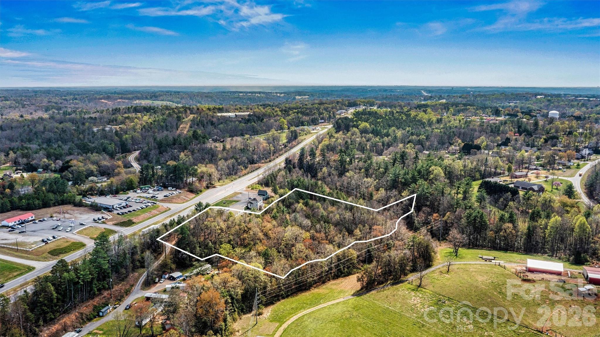 Aerial Hwy 321 South - Side/Rear View - Lot line overlay shown for illustrative purposes only - Note Little Gunpowder Creek Runs along rear property line. - 000 321 Highway, Granite Falls